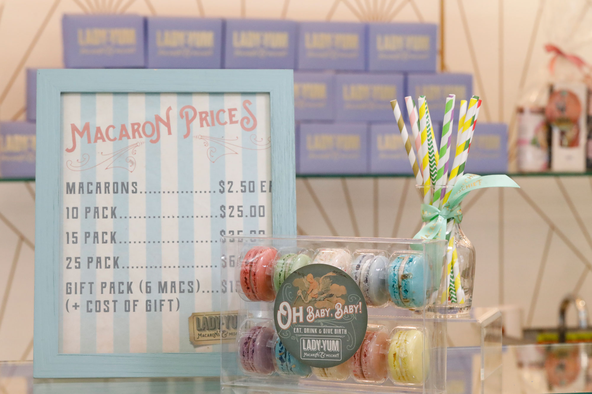 SEA Lady Yum Macaron Price Package Sign
