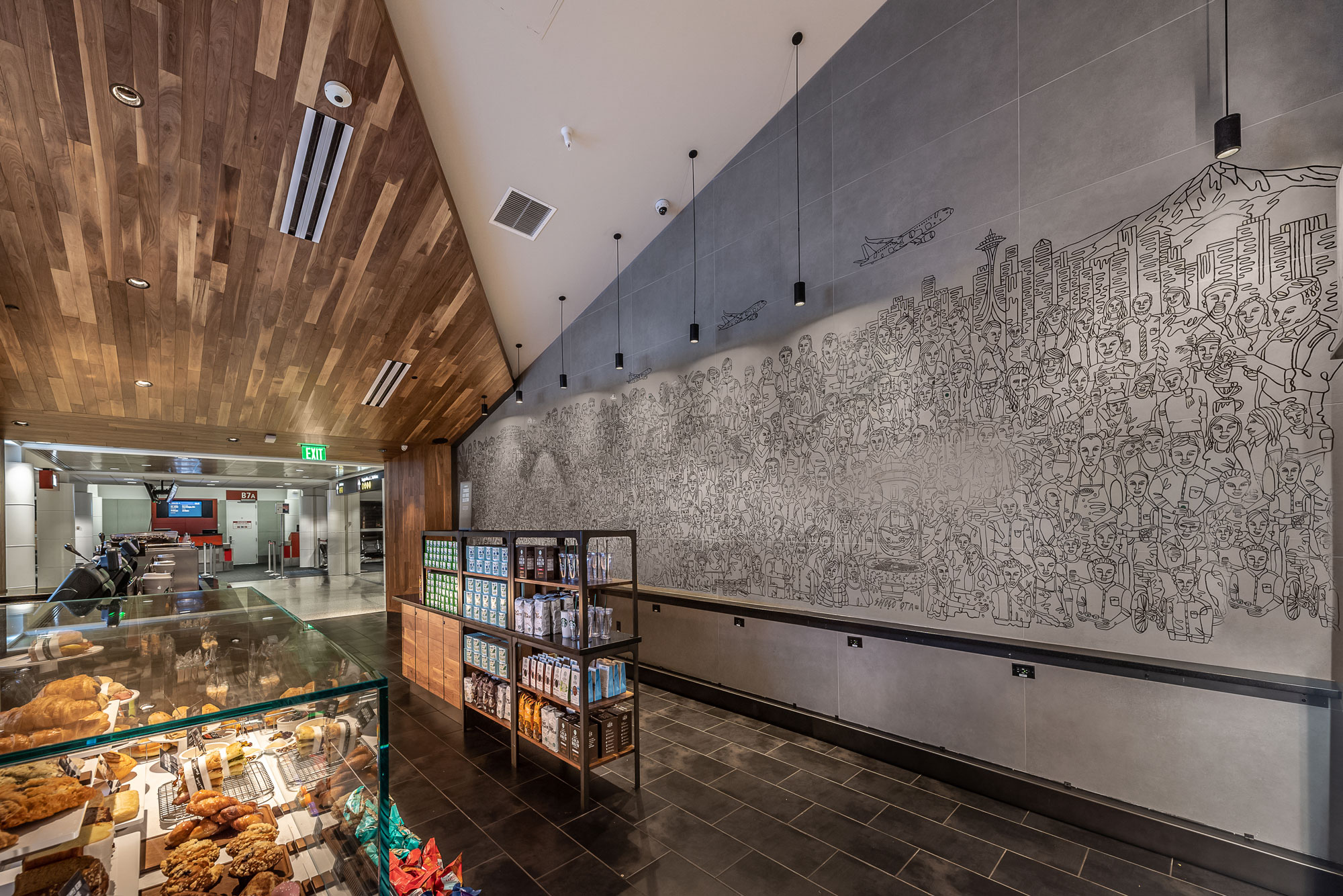 SEA Starbucks (B Gates) Interior with Designed Wall