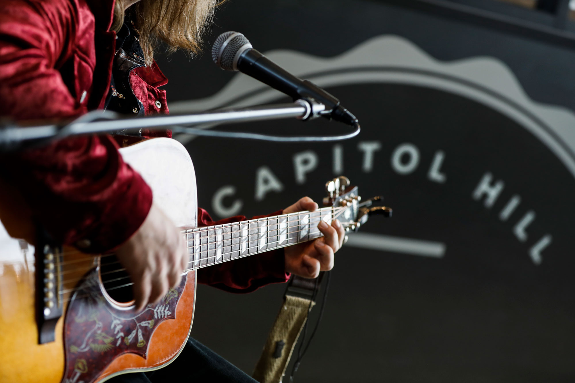 Music at SEA Program with Guitarist and Microphone at Capitol Hill Food Hall