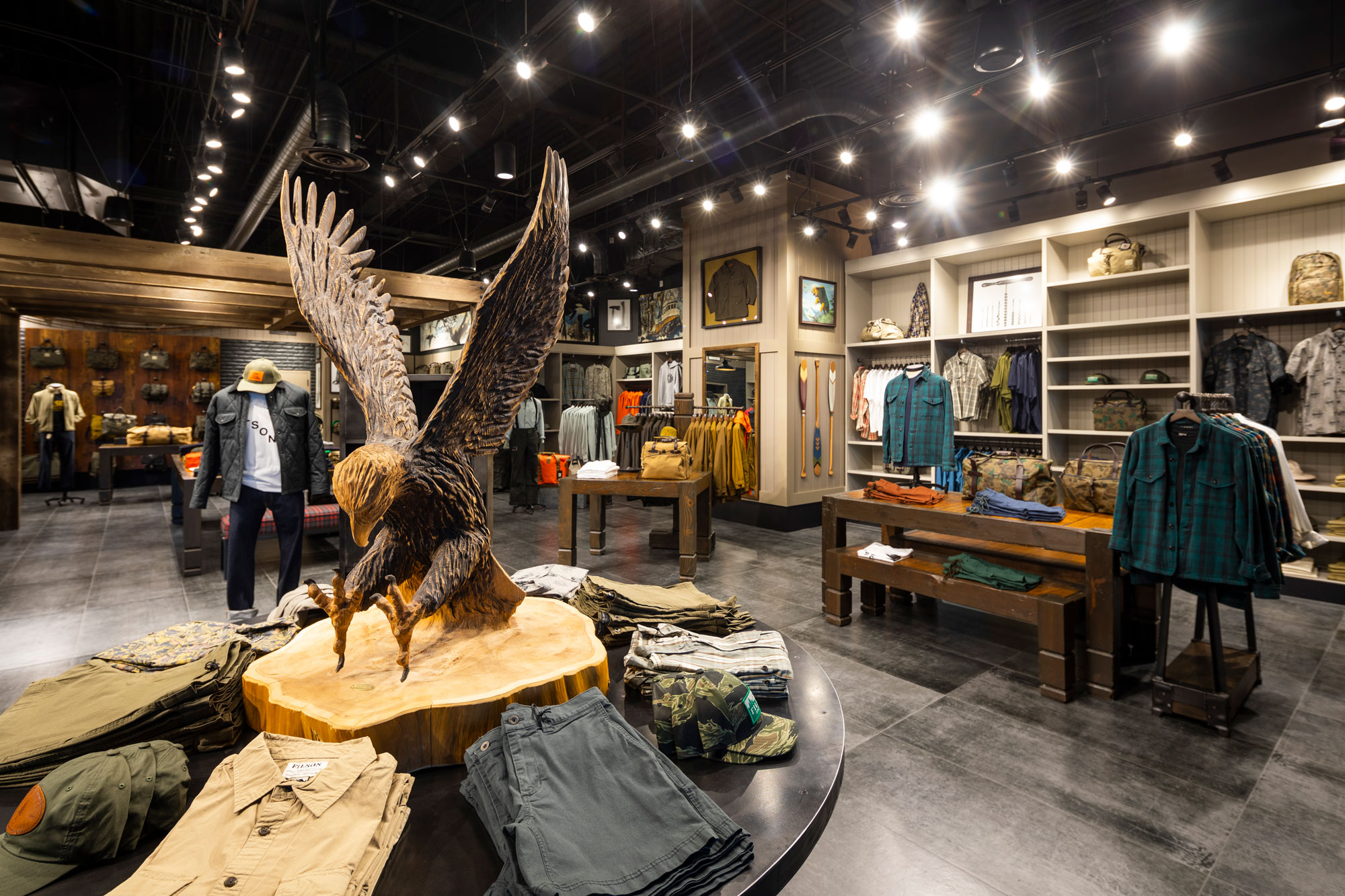 Filson interior with various merchandise and eagle sculpture