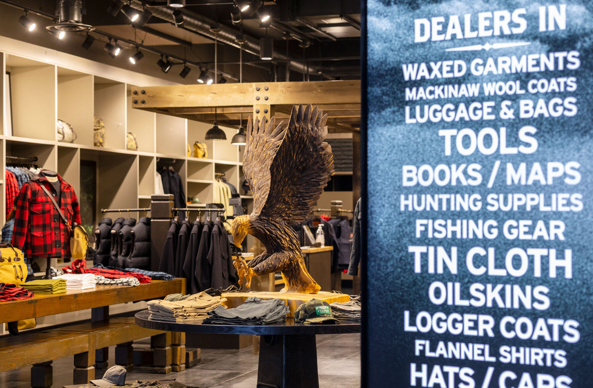 Filson interior view with signage and eagle sculpture