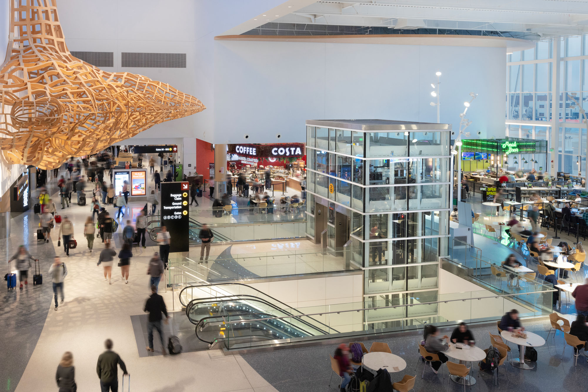 SEA North Concourse seating area looking at Costa Coffee and elevators