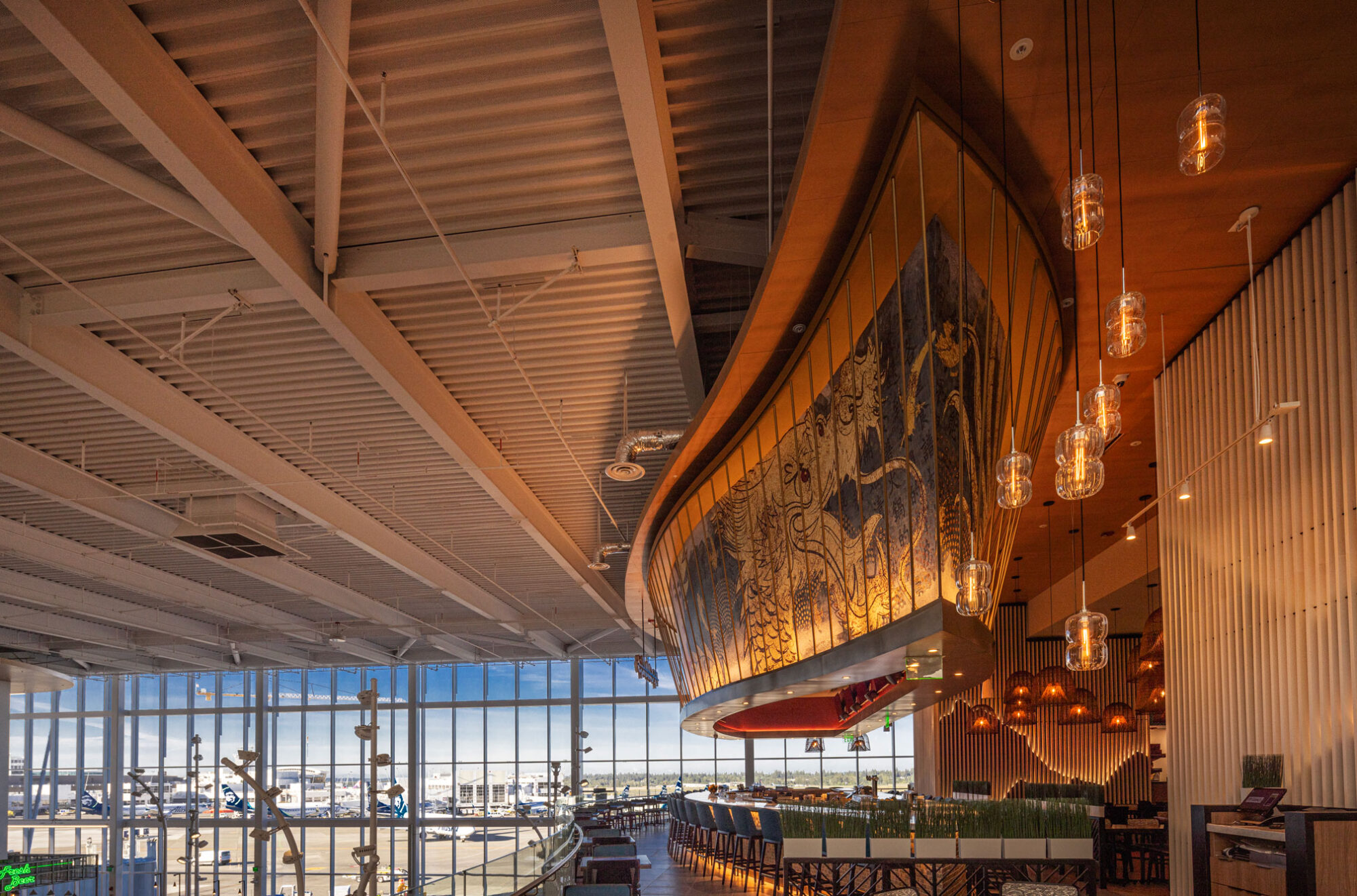 SEA Airport P.F. Chang's restaurant with floor to ceiling windows in the background