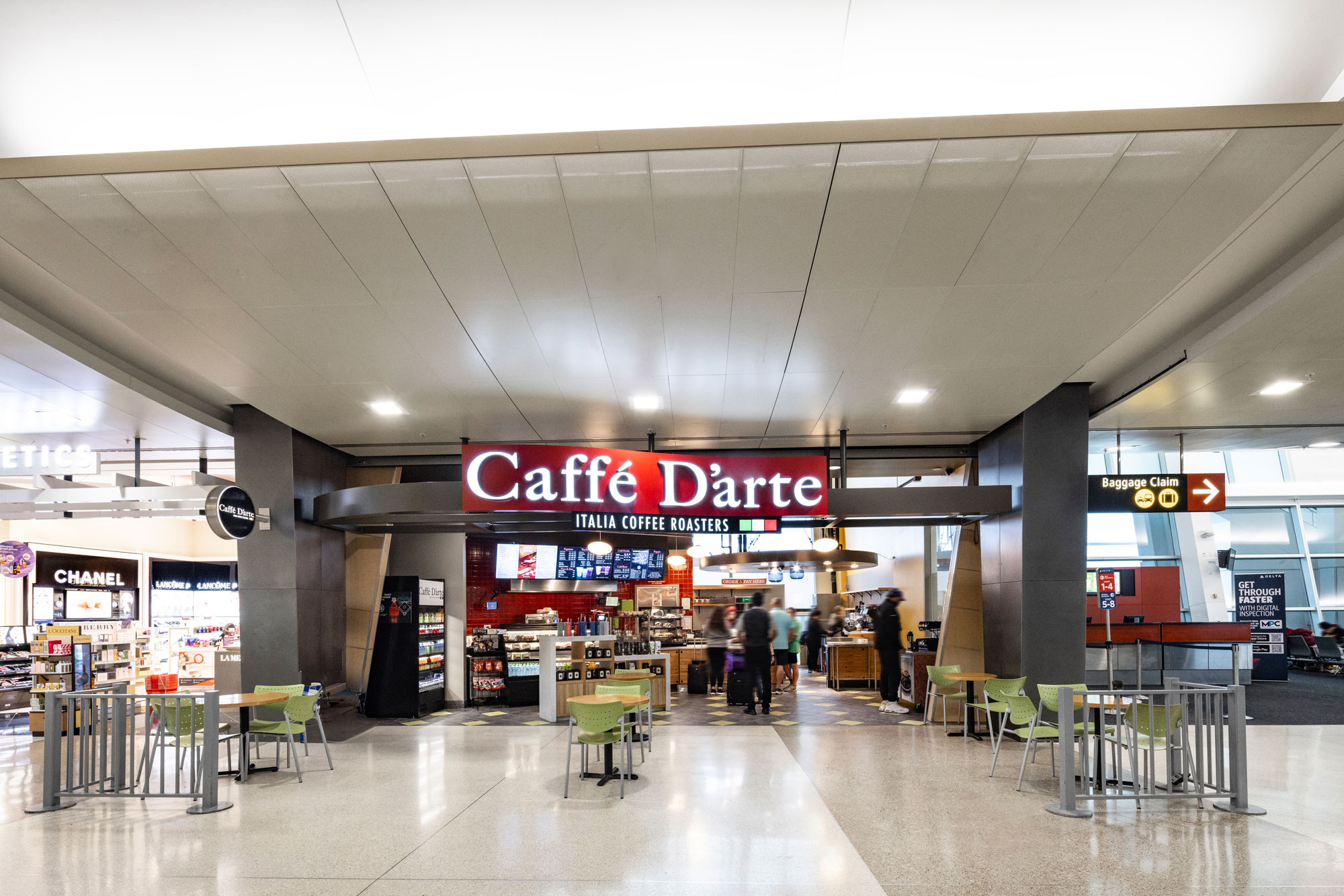 Caffe' D'arte at SEA Airport - Exterior view with seating in terminal