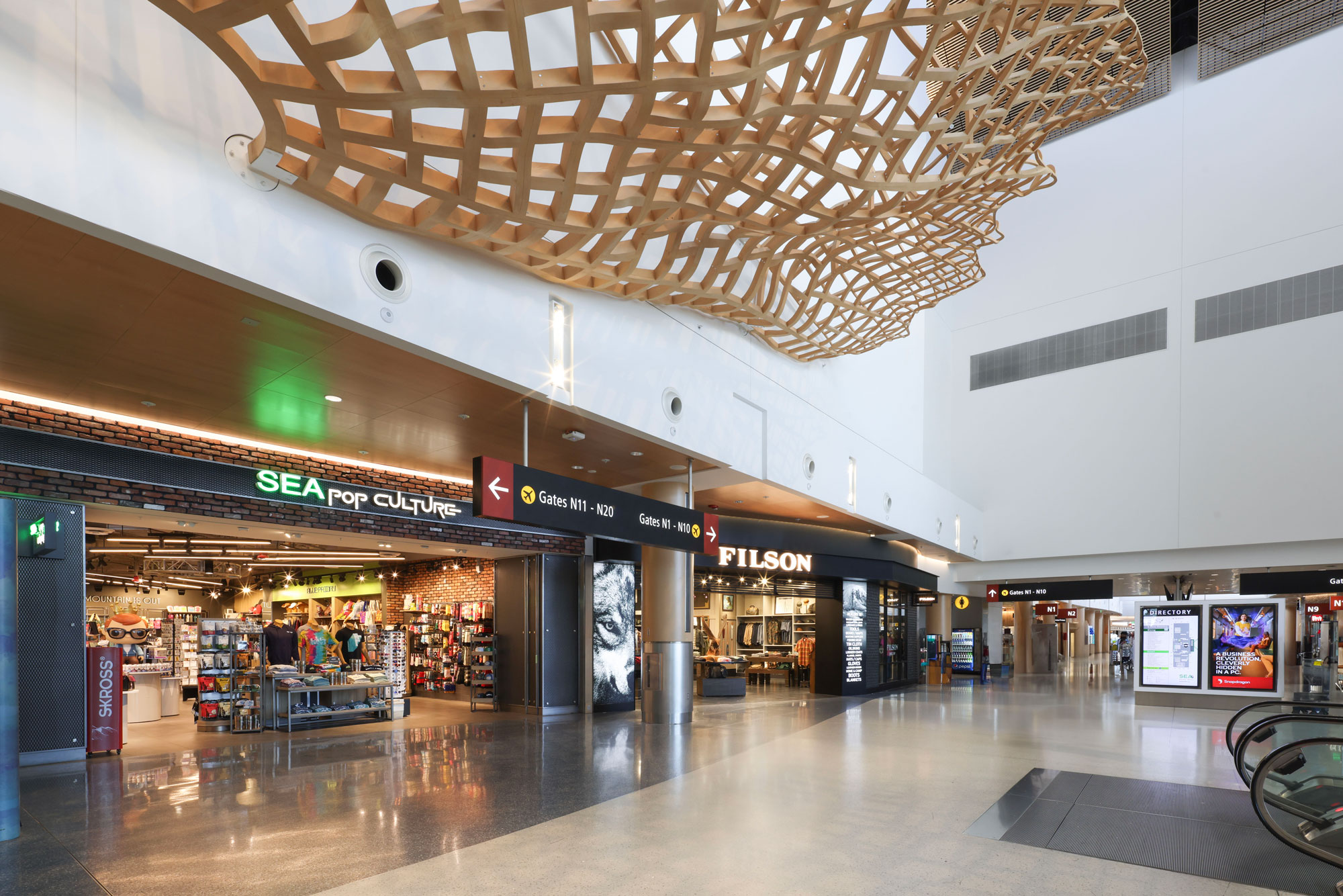 SEA Airport: SEApop Culture and Filson with airport ceiling artwork