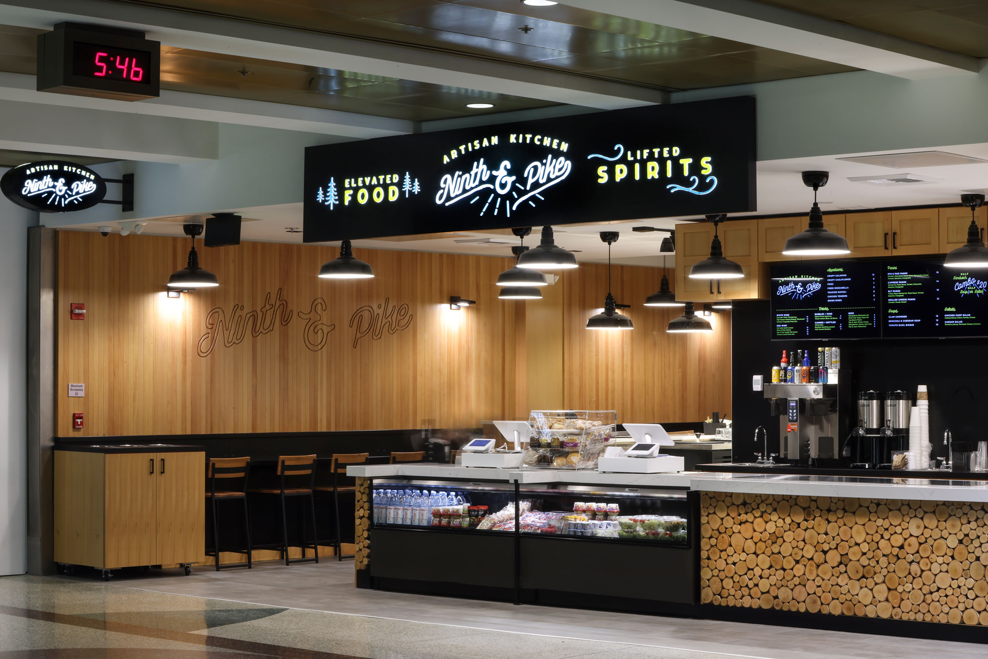 Ninth & Pike exterior view with decorative wall and grab and go counter