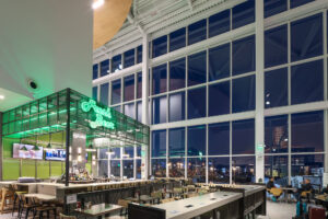 Open Space Tap Room bar and window seating at night