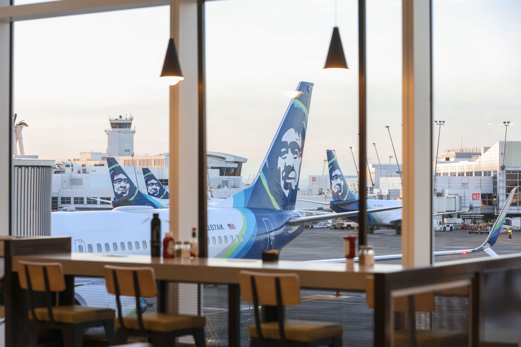 Open Space Tap Room window seating with view of planes
