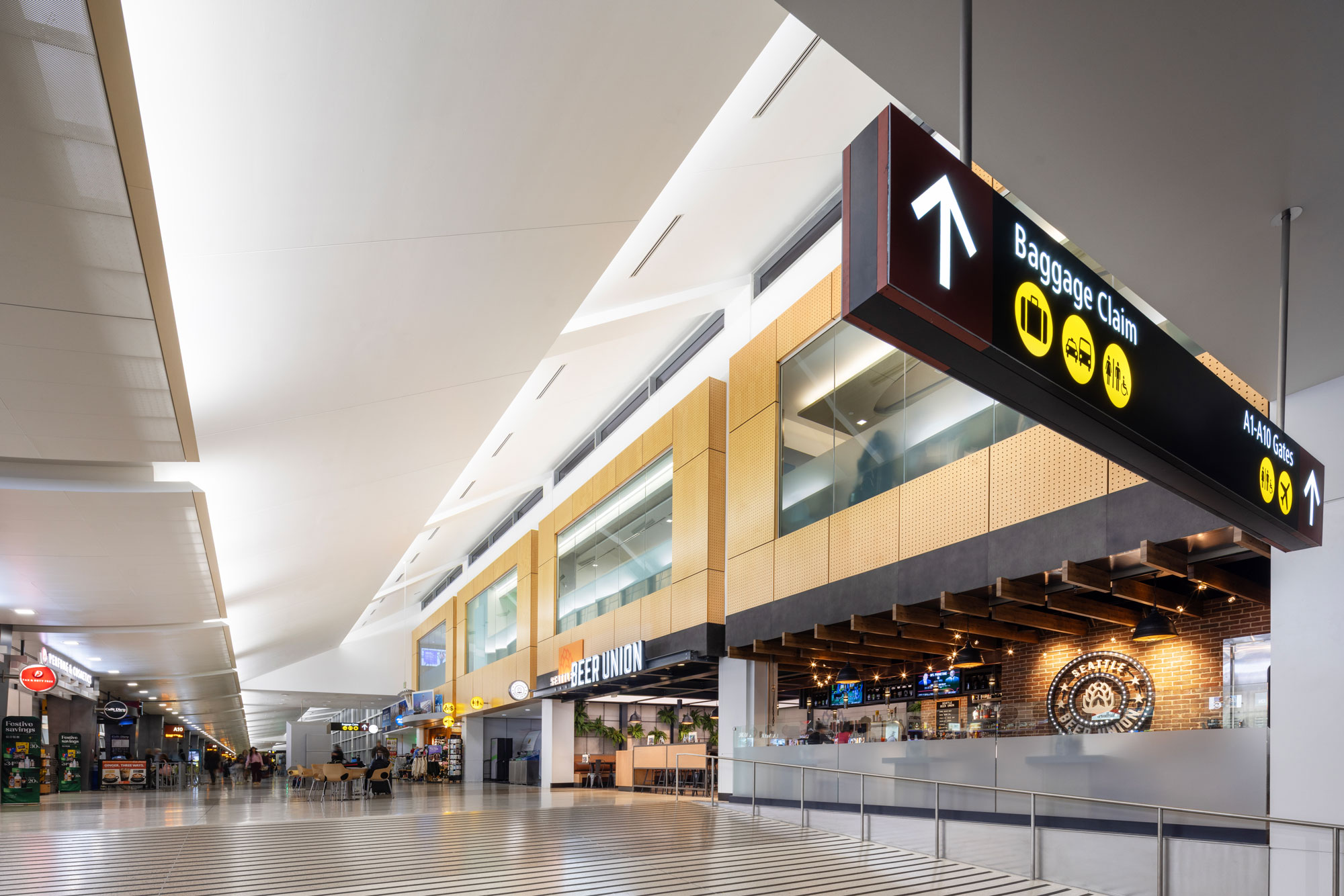 Seattle Beer Union with Baggage Claim and All Gates Signage
