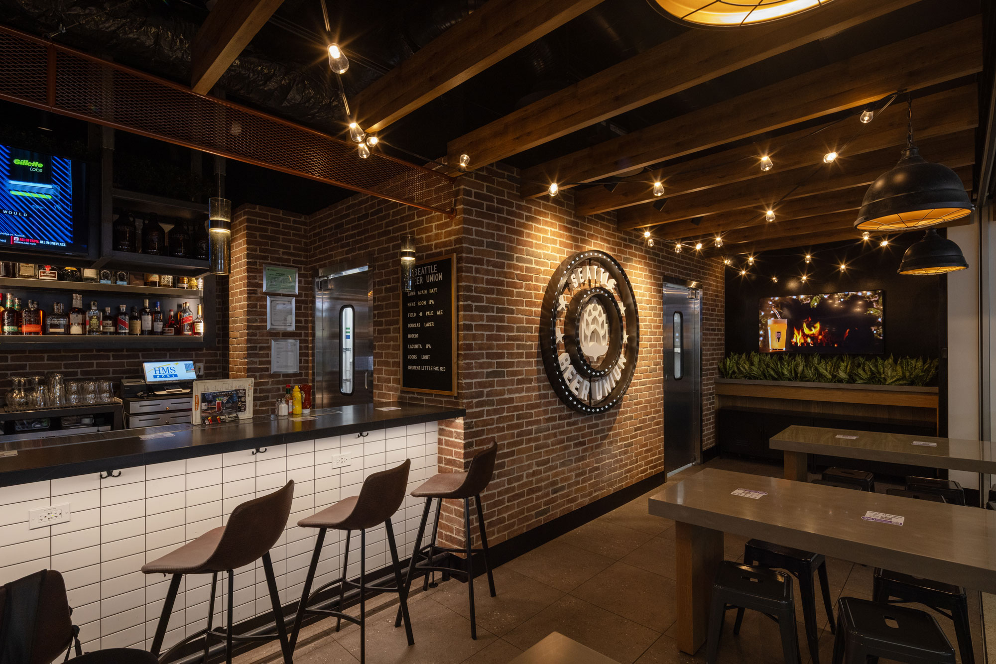 Seattle Beer Union Interior with bar seating and tables