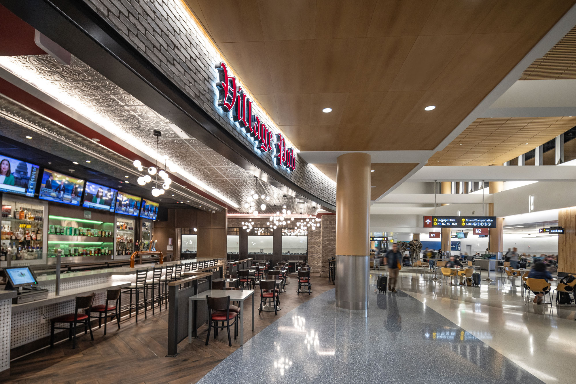 Village Pub Exterior View from N Concourse including shared terminal seating area
