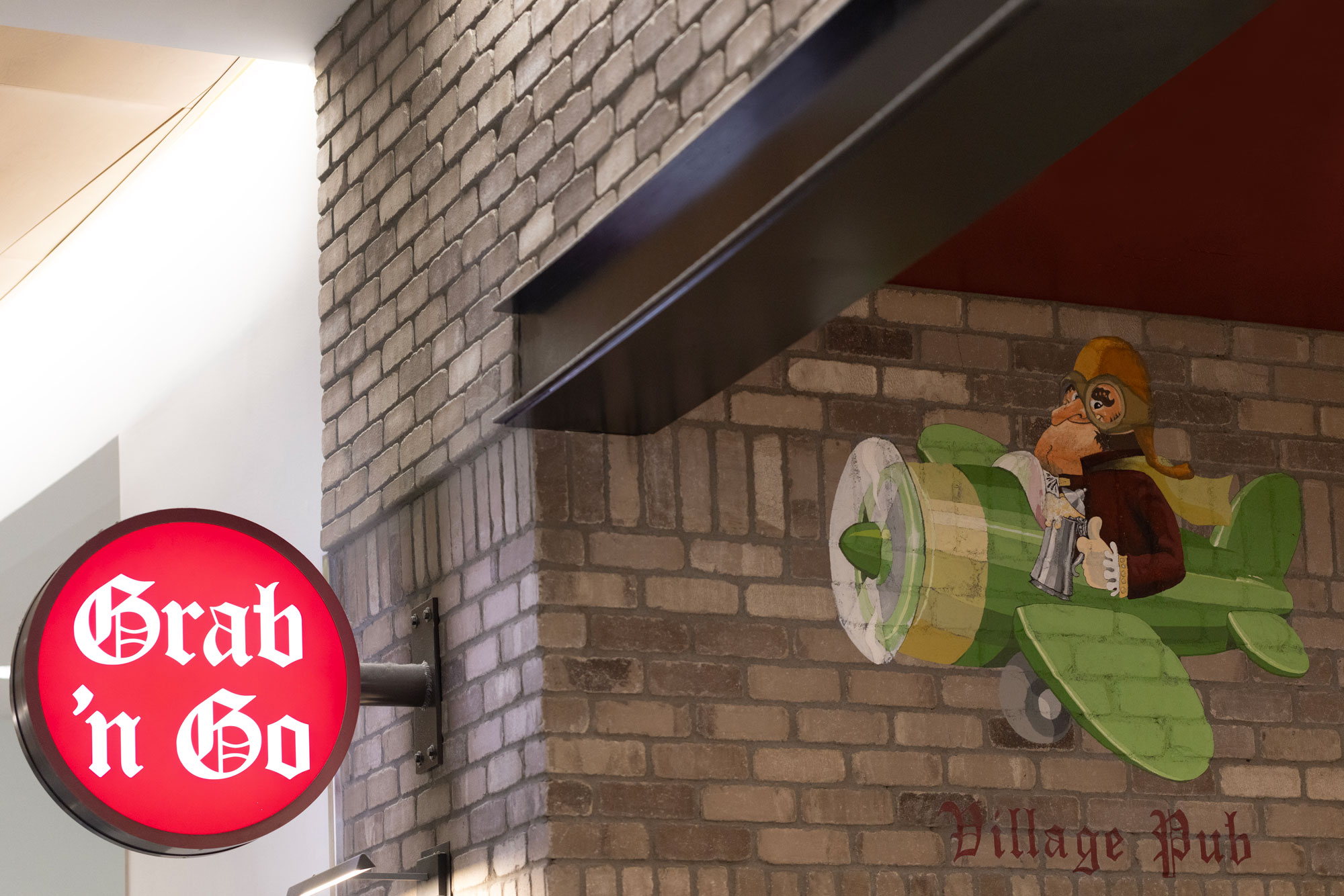 Village Pub Grab 'n Go blade sign