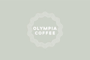 Olympia Coffee inverted white logo on green/grey background