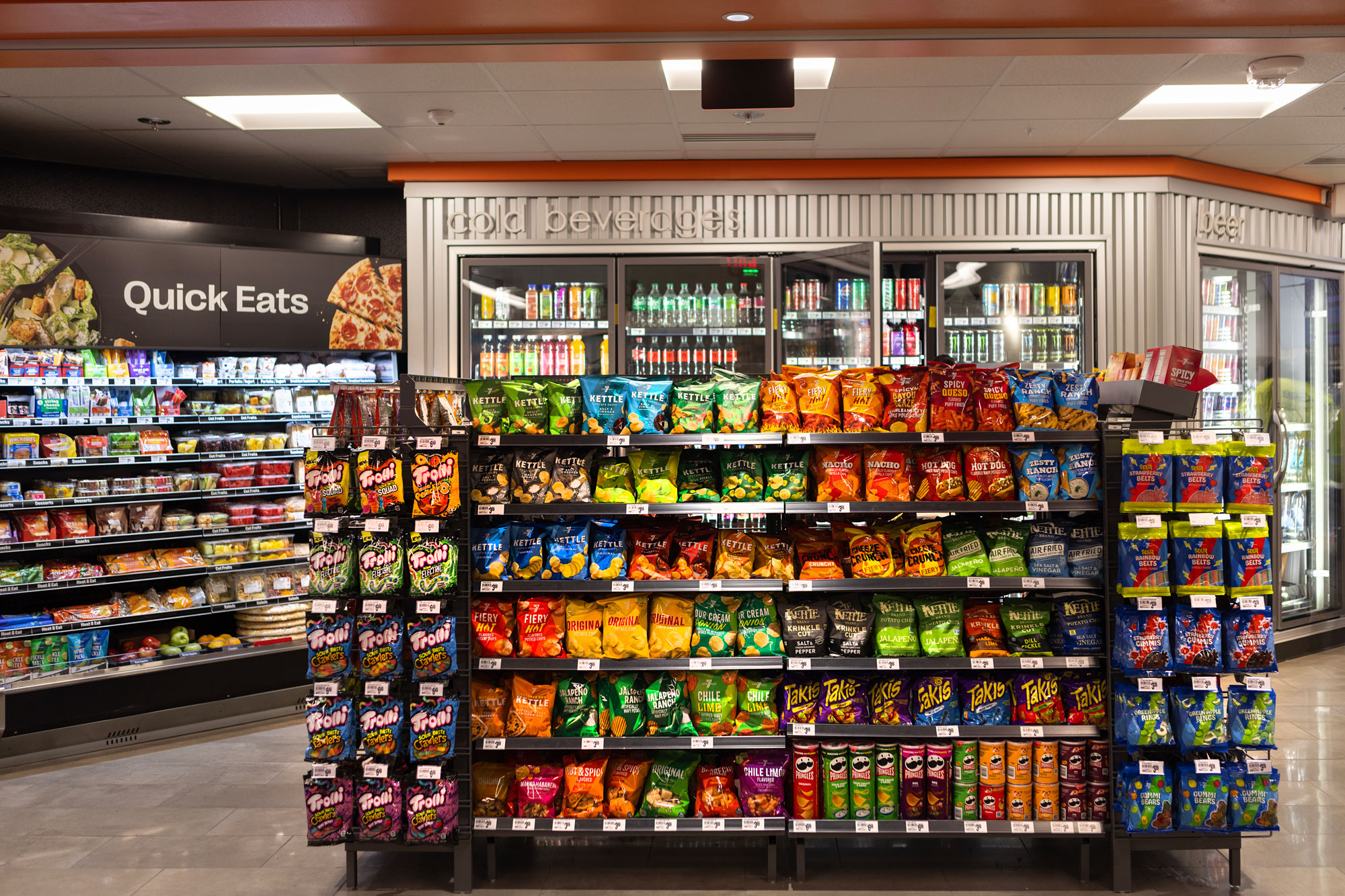 7-Eleven chip display with Quick Eats in the background