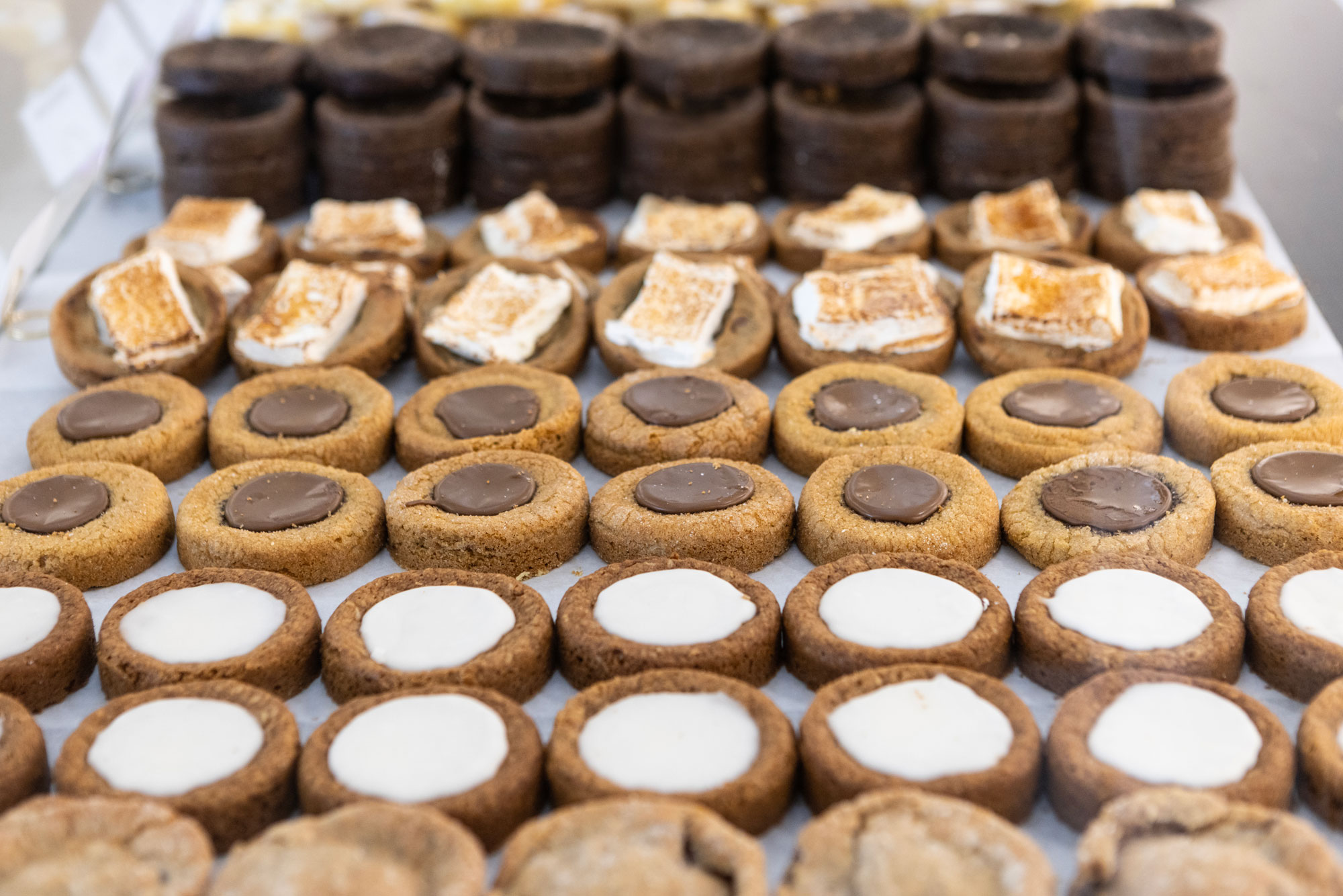 Lowrider Cookie Co. display with various cookie flavors