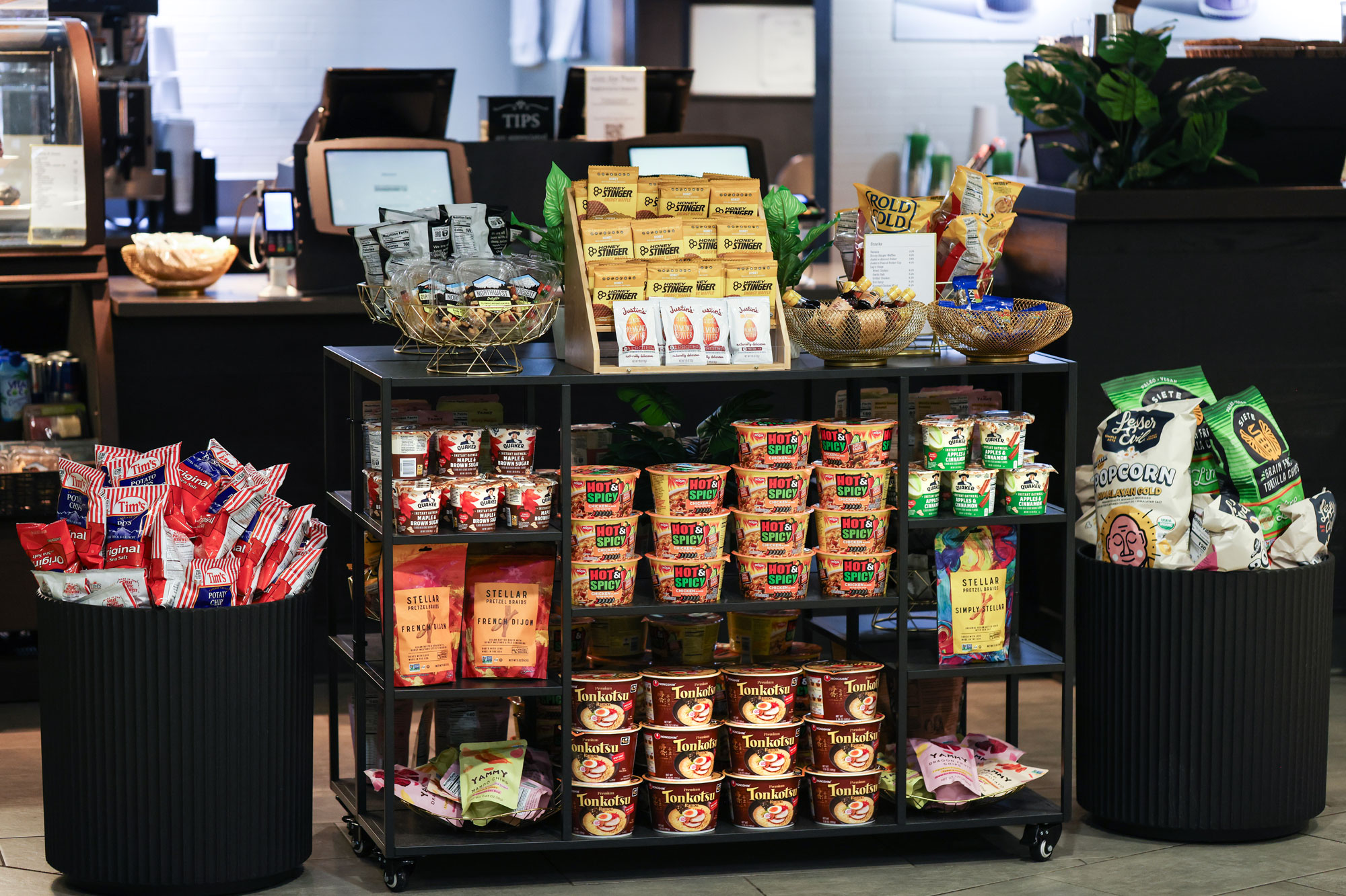 Neighborhood Cafe merchandise display with ramen bowls