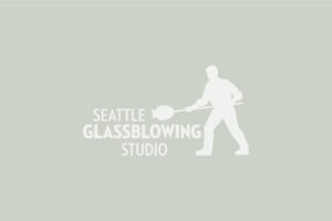 Seattle Glassblowing Studio logo on green/grey background