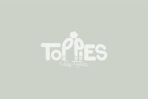 Toppies by Tyra logo on green/grey background