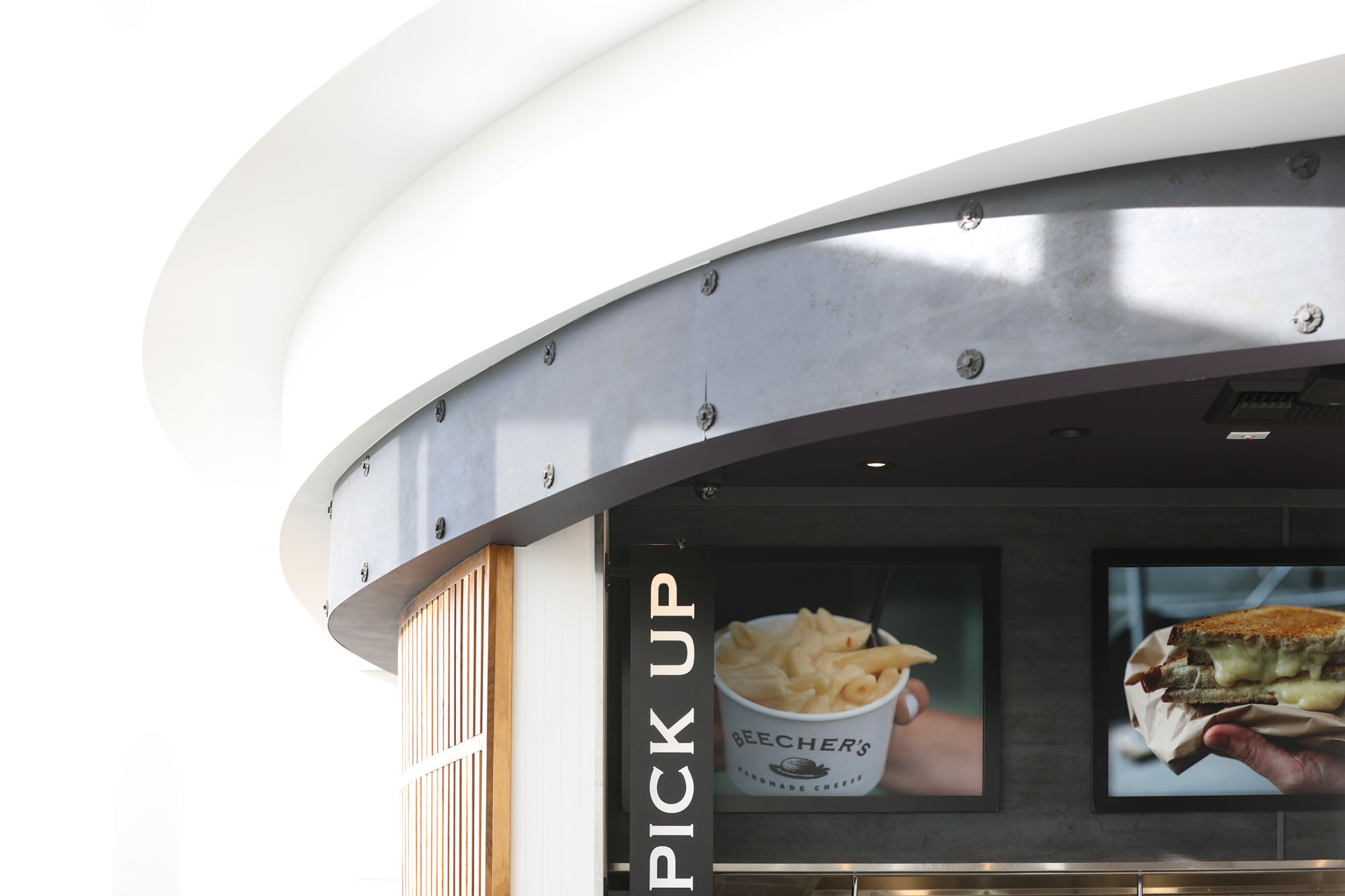 Beecher's architectural details with pick-up blade sign