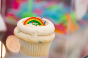 Cupcake Royale with rainbow frosting design