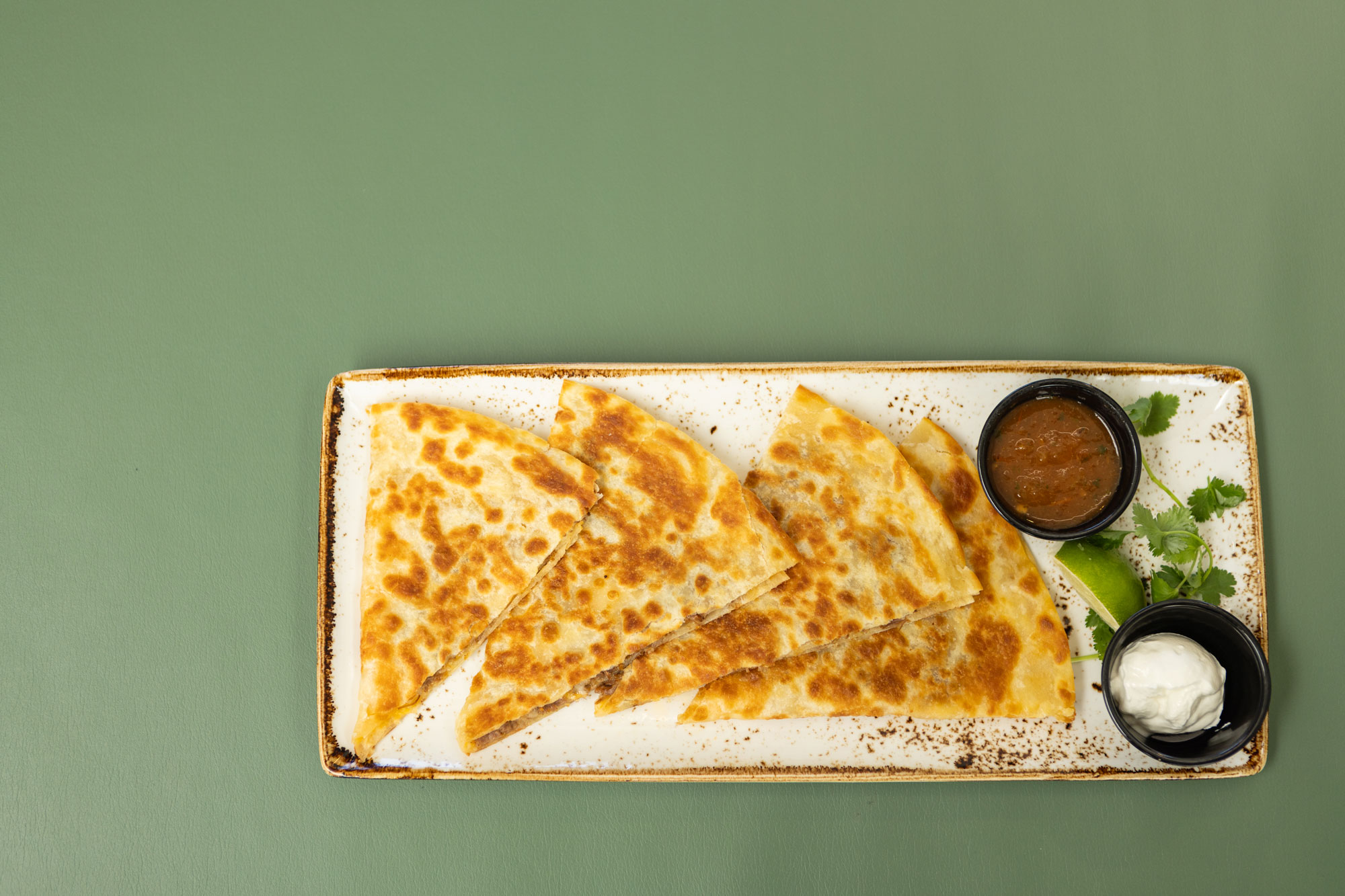 Mi Casa Cantina quesadilla with salsa and cream cheese