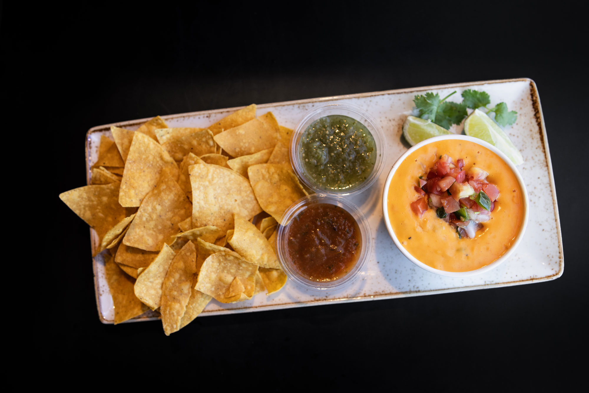 Mi Casa Cantina chips, queso and salsa