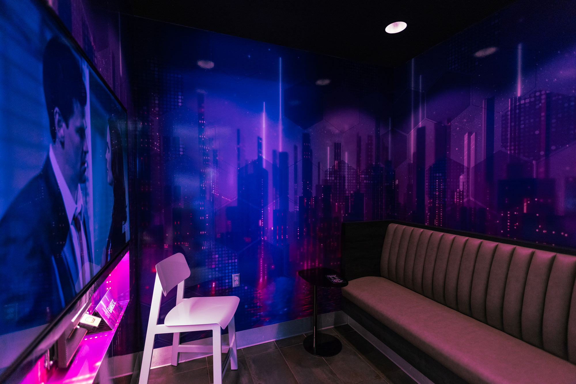 Sky Gamerz interior with private bench seating and digital screen