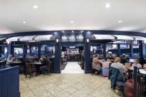 Smith Cove with travelers in exterior dining