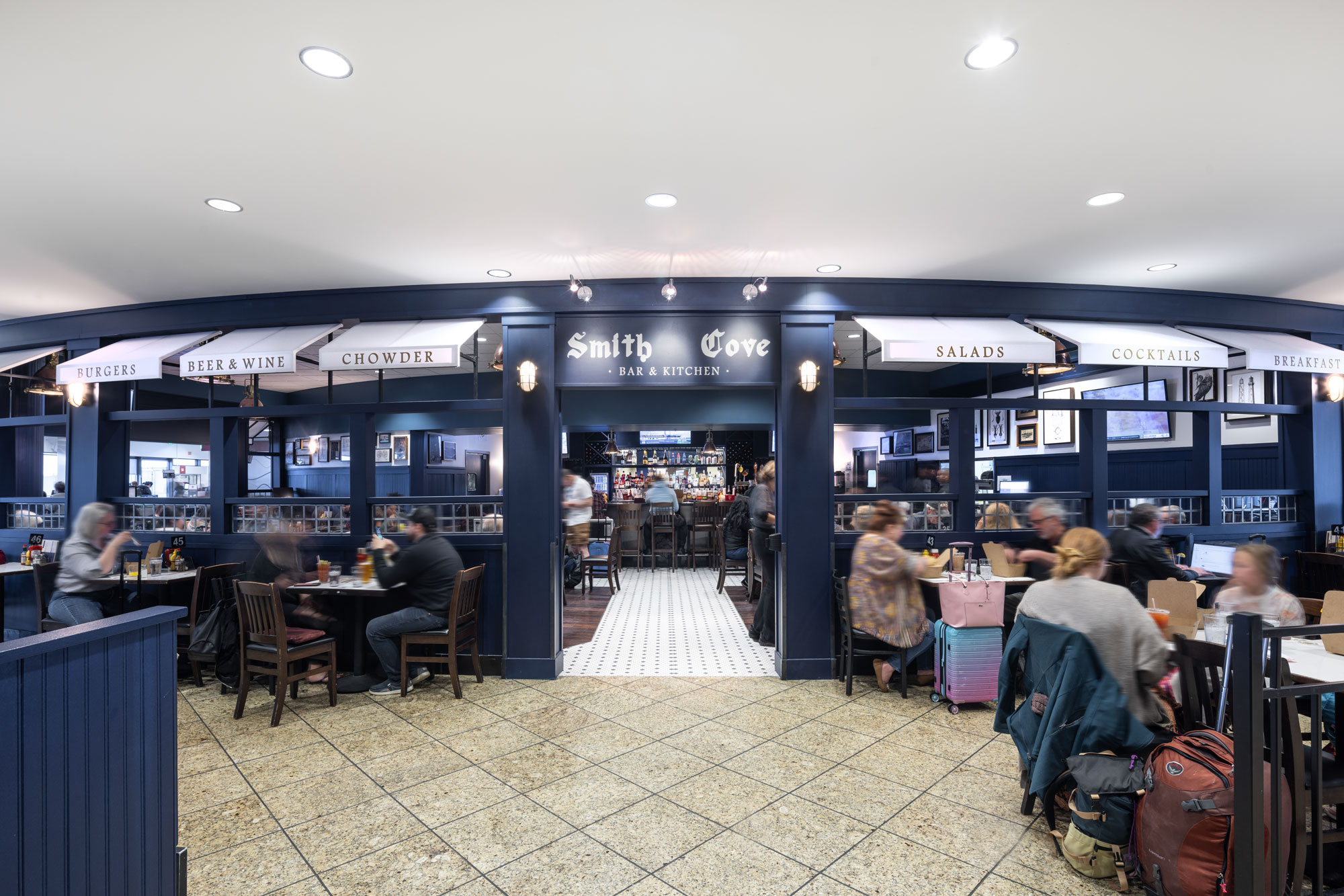 Smith Cove with travelers in exterior dining