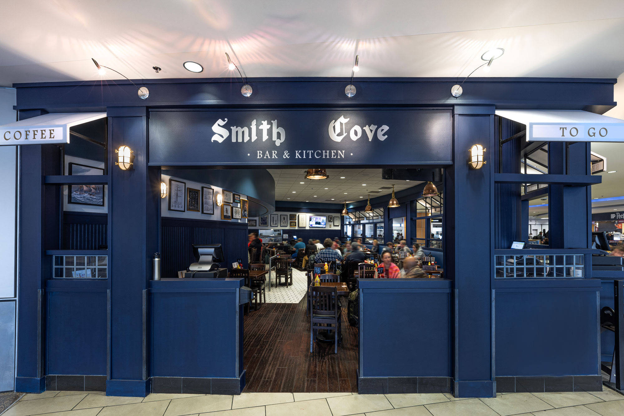 Smith Cove exterior with Coffee and To Go awnings