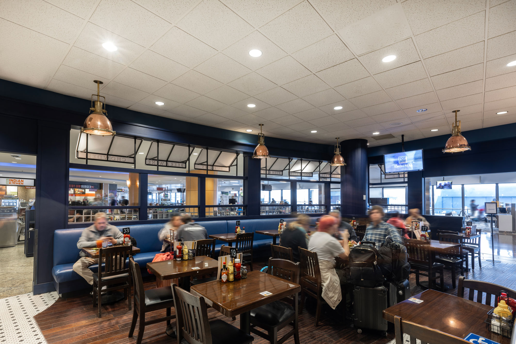 Smith Cove interior with various travelers dining