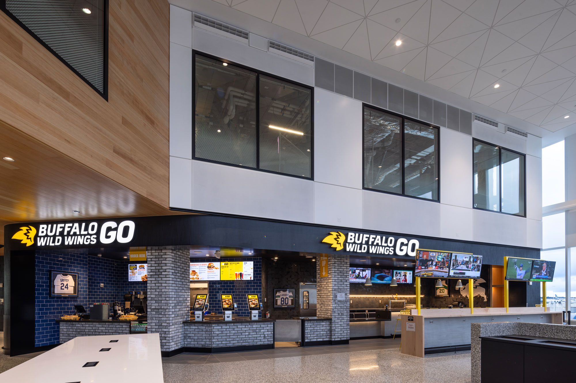 Buffalo Wild Wings straight on view with airport office windows
