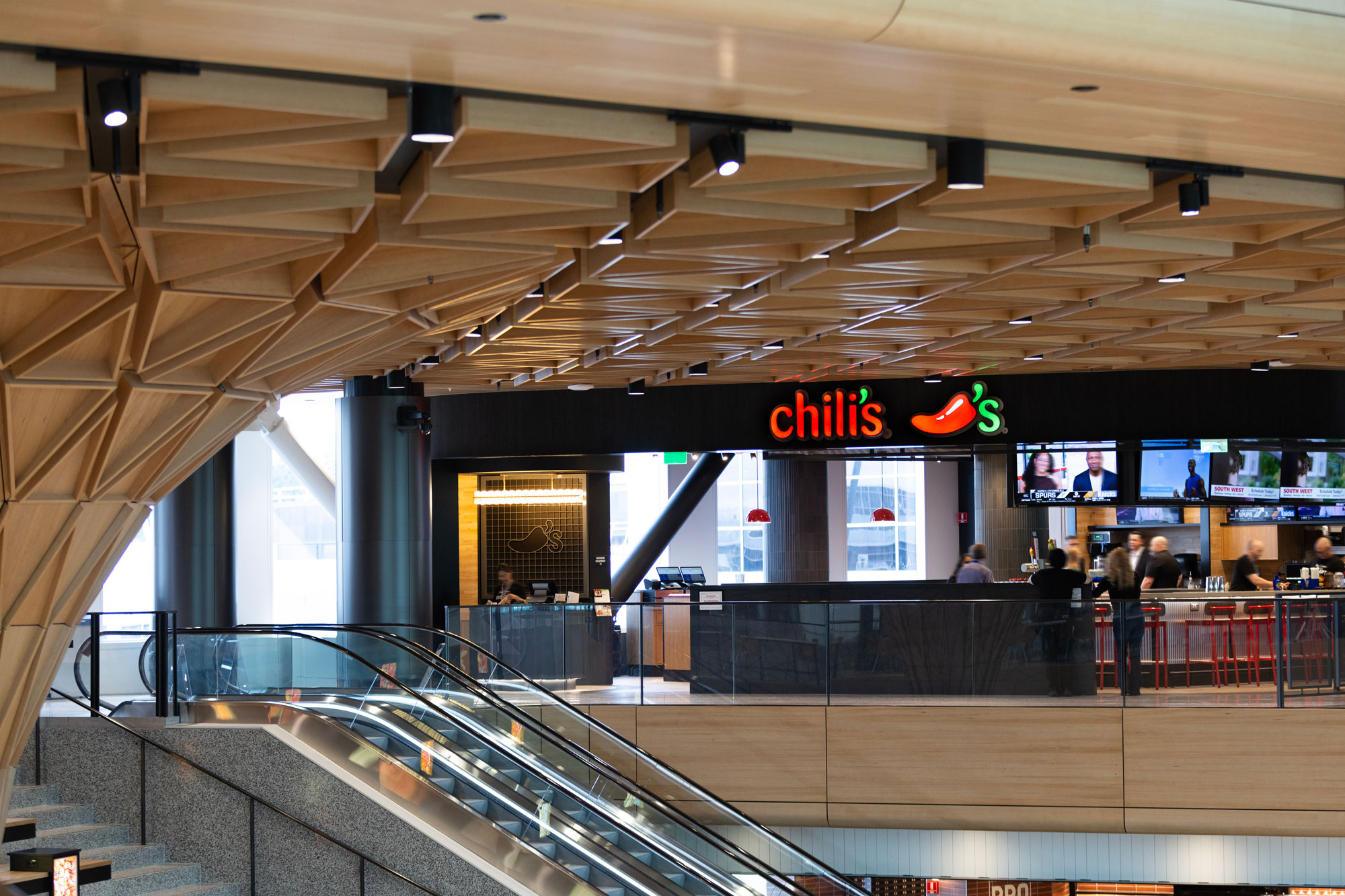 Chili's restaurant exterior with escalator in the foreground