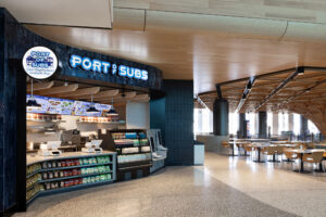 Port of Subs restaurant exterior with seating